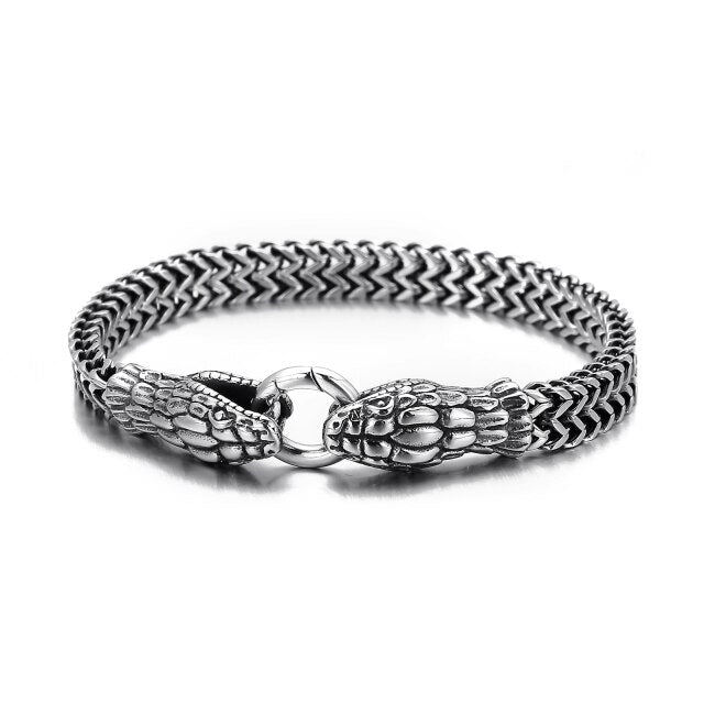 A Snake Bite Chain Bracelet by Rebel Saint Co. with a clasp.